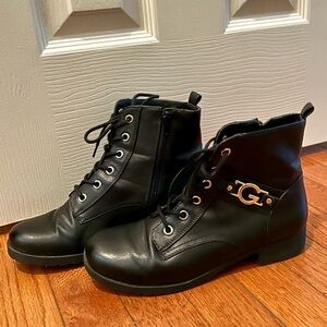 Black Leather Ankle Boots with Gold Accent